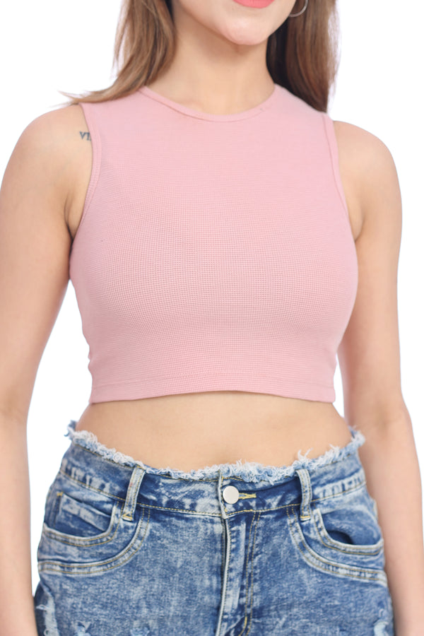 Ribbed sleeveless crop top in blush pink – soft, stylish, and breathable
